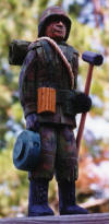 COMBAT ENGINEER:  This carving was made for a friend in Kansas City.  He is 11" tall and carved in basswood. (1996)